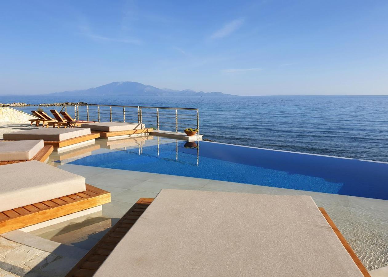 Tsamis Zante Suites (Adults Only) Psarou  المظهر الخارجي الصورة Infinity pool at the beach